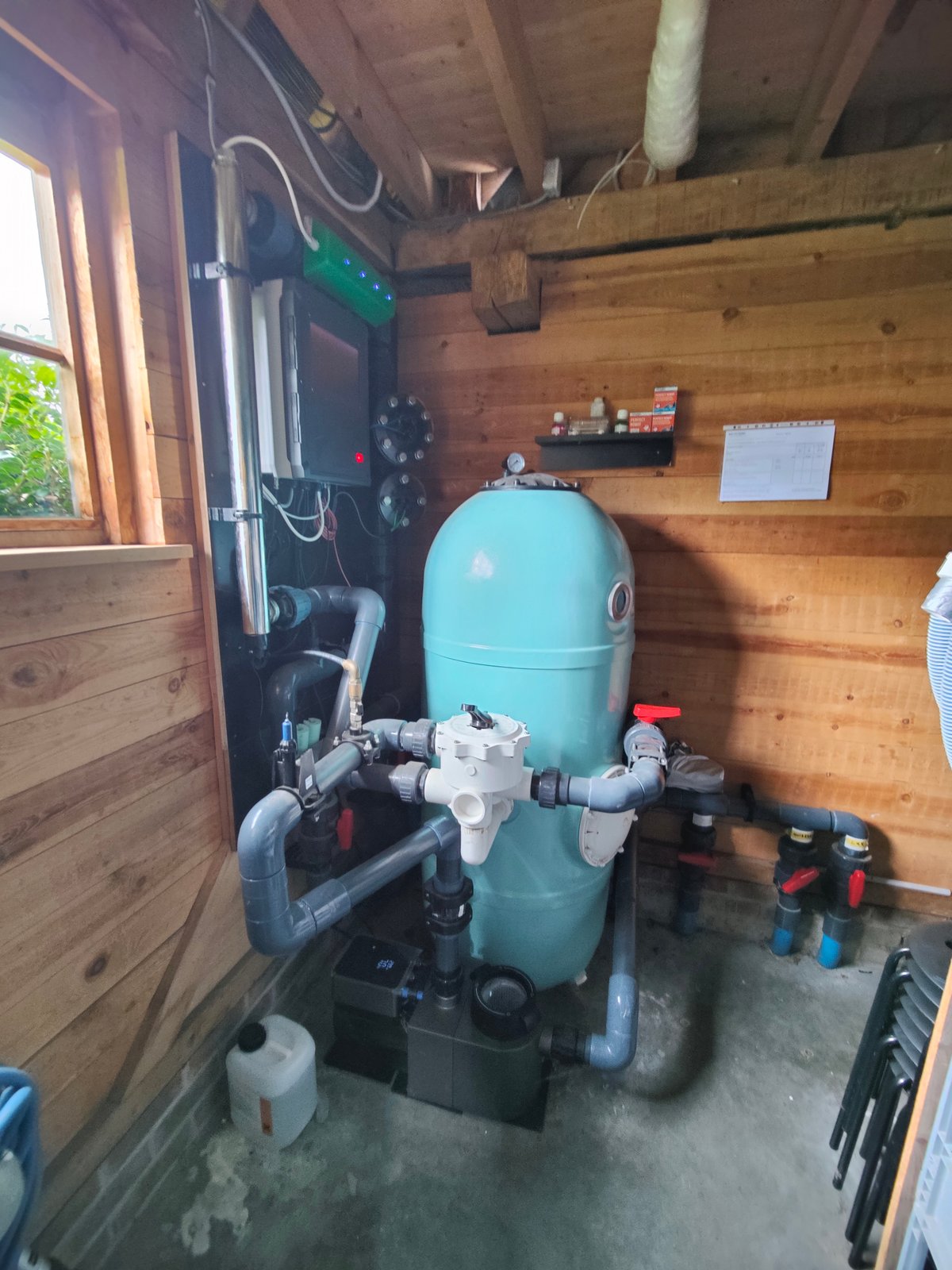 Professional Oxytronix installation with filter, control panel, and plumbing